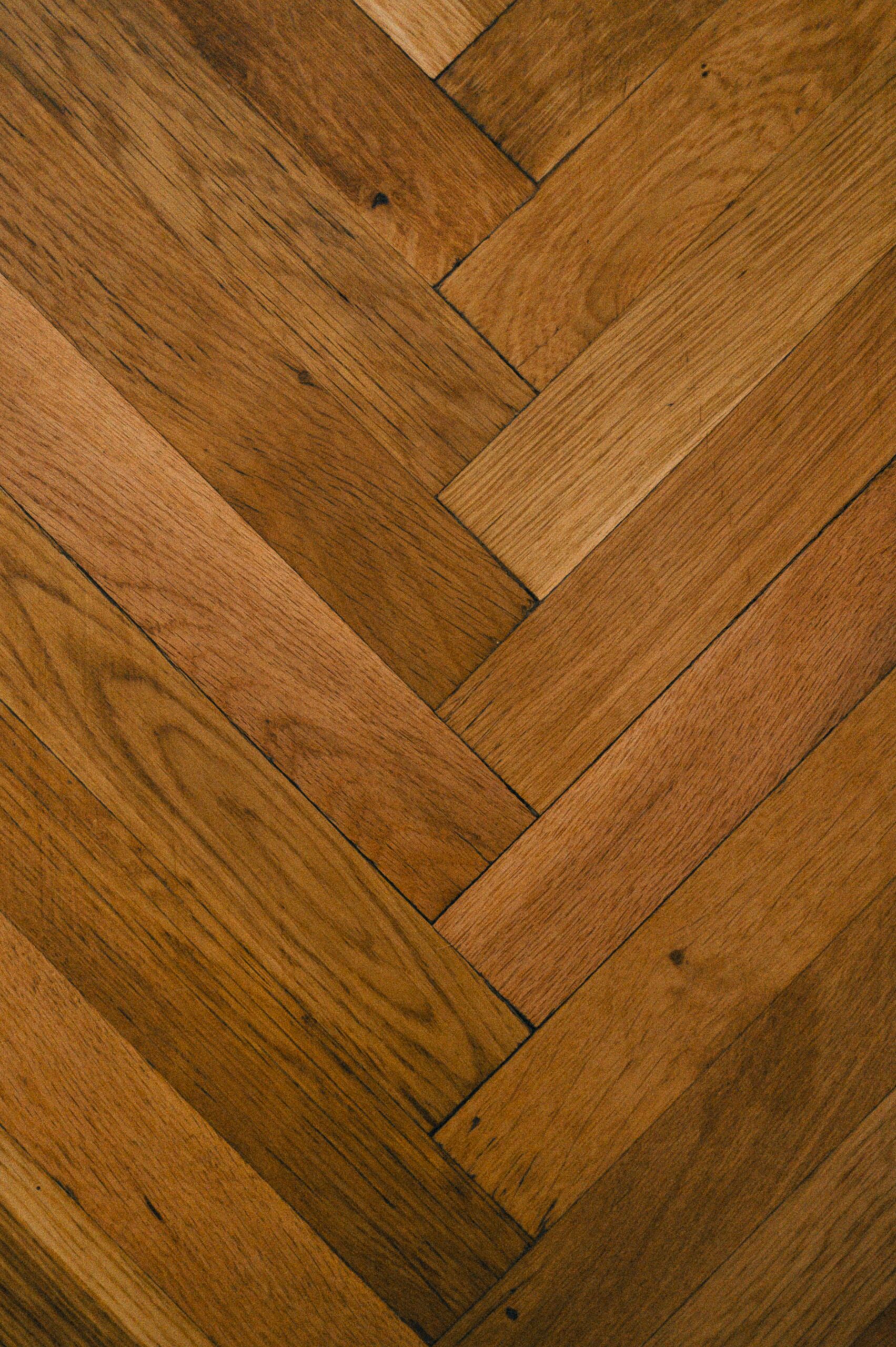 Oiled oak herringbone floor showing the warm, rich colour that Osmo oil brings out