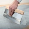 Double-Blade-Scraper-In-Use Double Blade Scraper In Use